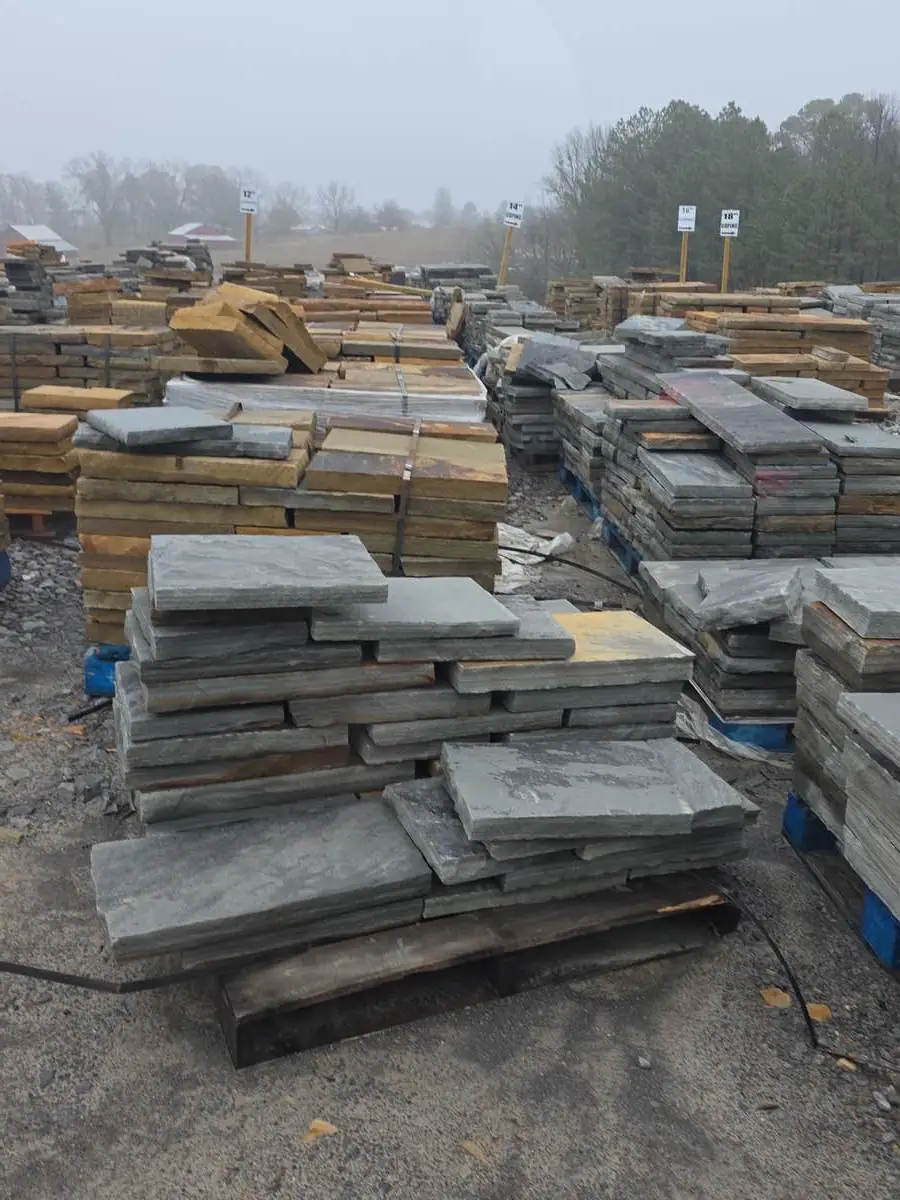 Organized flagstone pavers in various sizes for custom projects
